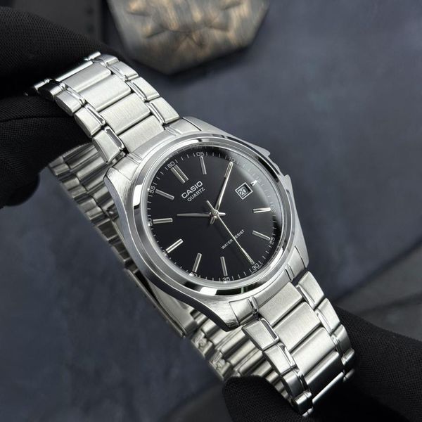 Чоловічий годинник Casio MTP-1183A-1A 1141-0102 фото